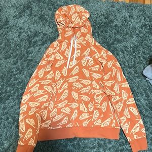 Orange Nike swoosh sweatshirt